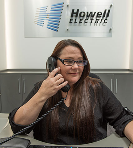 Woman answering a telephone
